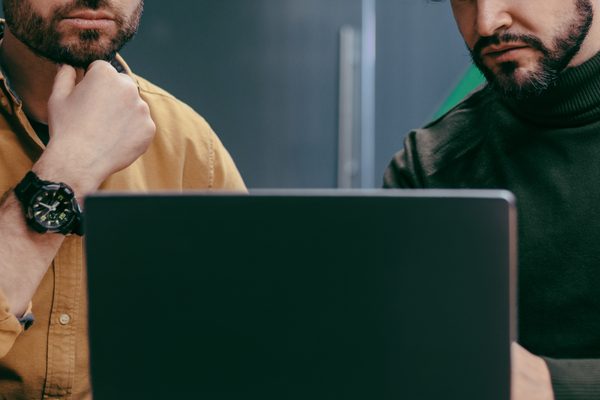 Two Blue Arctic engineers working through a support request together